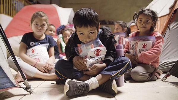 Thumbnail image of children who received care kits from Save The Children in Mexico.