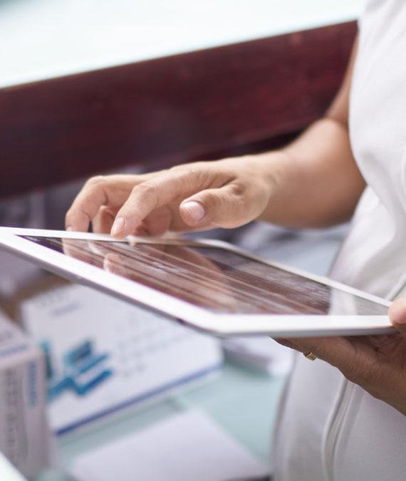 Nurse looking at a tablet